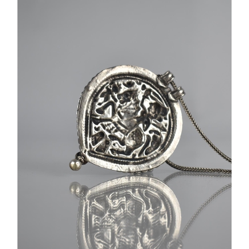 193 - A Large White Metal Indian Pendant on Chain, Embossed Decoration, Possibly Depicting Ashwarooda Devi... 