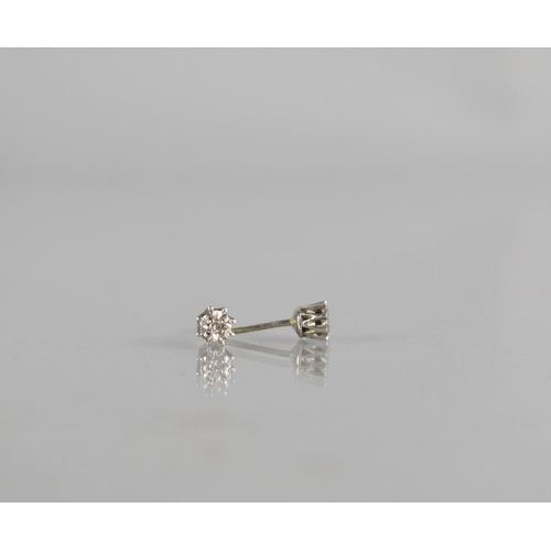 107 - A Pair of Diamond Stud Earrings, Central Round Brilliant Cut Stone Approx 1mm Diameter, Illusion Set... 