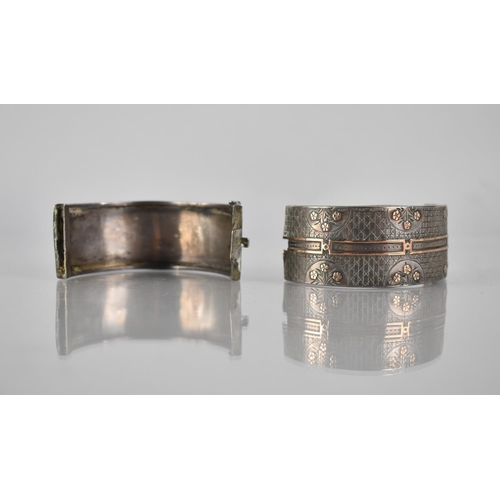 285 - An Aesthetic Victorian Silver Hinged Bangle, Gold Coloured Metal Flashing to Front Panel having Flor... 