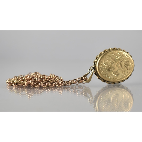 116 - A 9ct Gold Locket, Oval Form with Chased Floriate Decoration, 45mm Drop Including Bale, Stamped 375 ... 