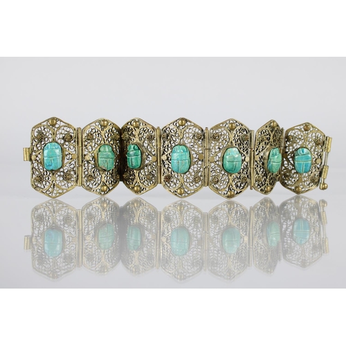 198 - A Vintage Egyptian Filigree Base Metal and Faience Scarab Beetle Panel Bracelet, Seven Six Sided Pan... 