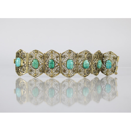 198 - A Vintage Egyptian Filigree Base Metal and Faience Scarab Beetle Panel Bracelet, Seven Six Sided Pan... 