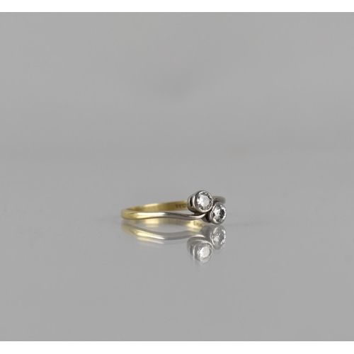 48 - An 18ct Gold 'Moi Et Toi' Ring, Each Diamond Approx 0.25ct, Bezel Set in White Metal Leading to Twis... 