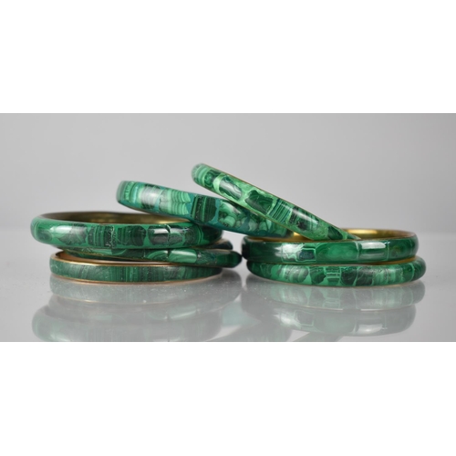 207 - A Collection of 9 Malachite and Reconstituted Malachite Bangles