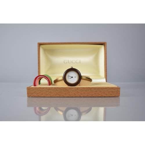 12 - A Boxed Gucci Wrist Watch, White Enamel Dial Inscribed Gucci, Gold Coloured Hands, Interchangeable P... 