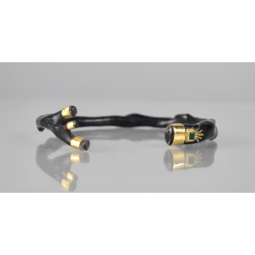 213 - A Black Coral Bangle/Cuff, Collared in Yellow Metal and Having Mounted Emerald Cut Green Stone Mount... 