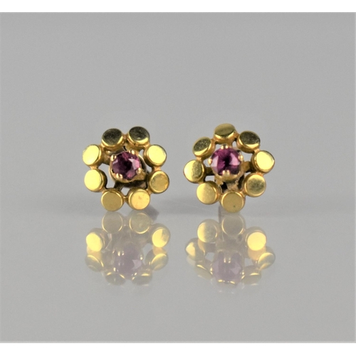 137 - A Pair of Ruby and 9ct Gold Earrings, Small Round Cut Rubies Measuring Approx 2mm Diameter, Supporte... 