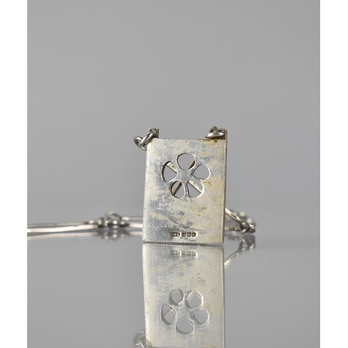 226 - A Mid Century Silver Rectangular Pendant and Chain, Hand Hammered and Fret Cut with Five Petal Flora... 