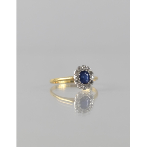 62 - An 18ct Gold and Platinum Mounted Sapphire and Diamond Ring, Centre Elongated Cushion Cut Sapphire M... 