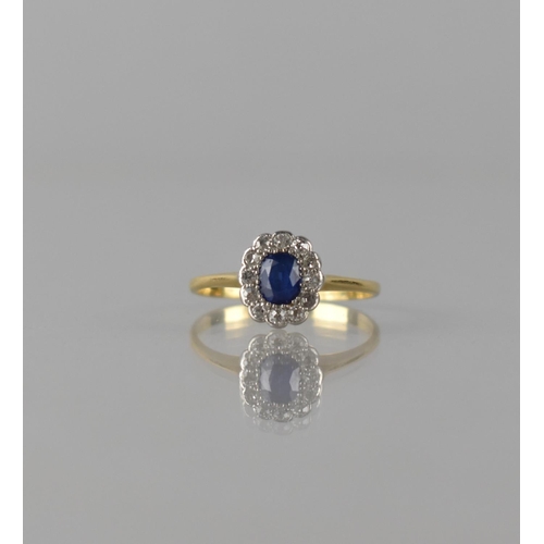 62 - An 18ct Gold and Platinum Mounted Sapphire and Diamond Ring, Centre Elongated Cushion Cut Sapphire M... 