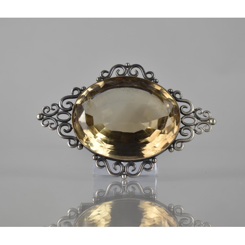 214 - A Very Large Citrine Brooch, Centre Mixed Oval Cut Stone Measuring 47mm by 38mm by 22mm Deep Approx,... 