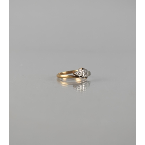 71 - An Early 20th Century 9ct Gold and Platinum Mounted Three Stone Diamond Ring, Central Round Cut Ston... 