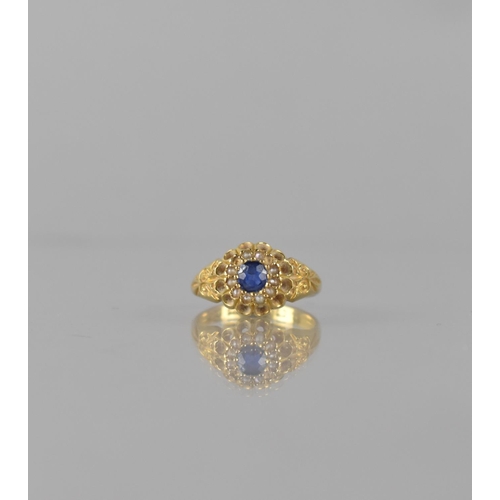 79 - A Victorian Sapphire and Seed Pearl Ladies Dress Ring, Central Stone Measuring 4mm by 3.5mm Approx a... 