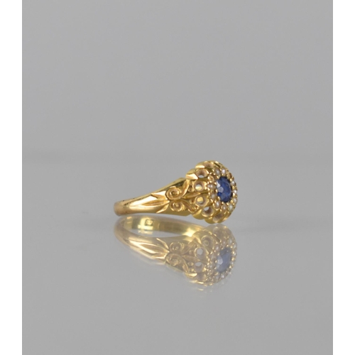 79 - A Victorian Sapphire and Seed Pearl Ladies Dress Ring, Central Stone Measuring 4mm by 3.5mm Approx a... 