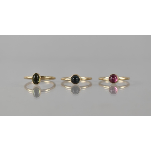 80 - A Set of Three 9ct Gold Stacking Rings, Cabochon Stones Each Bezel Set on a Raised Head to a Polishe... 