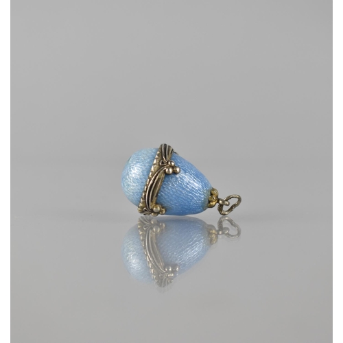 291 - A Small Guilloche Enamelled and Silver Mounted Egg, Pale Blue Enamel with Stylised Ribbon Band, Stam... 