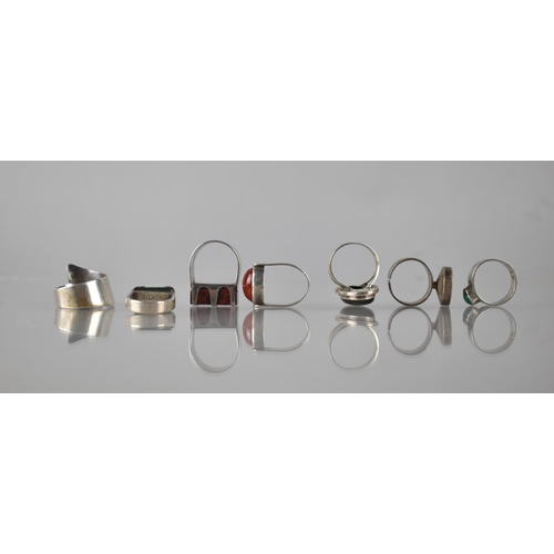 314 - A Collection of Seven Jewelled Silver and White Metal Rings, Various Styles, Mainly Modernist, to in... 