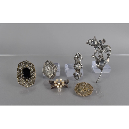 320 - Two Victorian White Metal Brooches, a Modern White Metal Brooch in the Form of a Flower and a Vintag... 