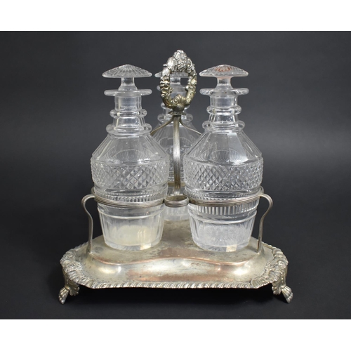 104 - A Georgian Three Bottle Tantalus on Silver Plated Stand, Glass Bottles of Mallet Form having Cut Hob... 