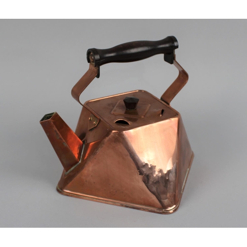 11 - An Arts and Crafts Copper Kettle of Square Form with Bakelite Handle, 20cms High