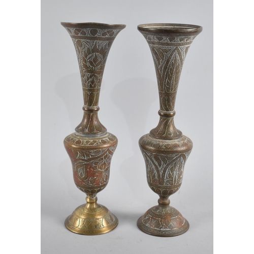 116 - A Pair of Arabic Brass Trumpet Vases with Incised Decoration, 26cms High, AF