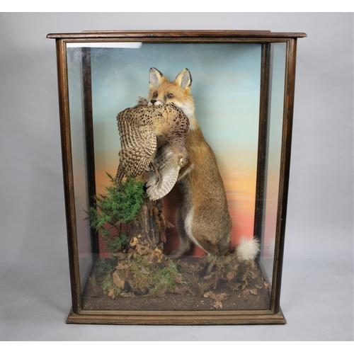 138 - A Cased Taxidermy Study of Fox with Pheasant Prey in Naturalistic Setting, by C. Griffith. Case is 1... 