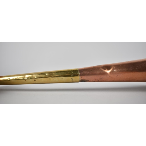 14 - A Copper and Brass Hunting Horn, 23cms High