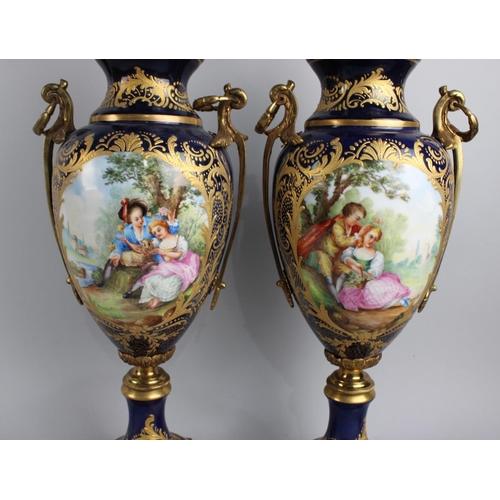 175 - A Pair of French Cobalt Blue and Gilt Table Lamps in the Form of Two Handled Vases with Hand Painted... 