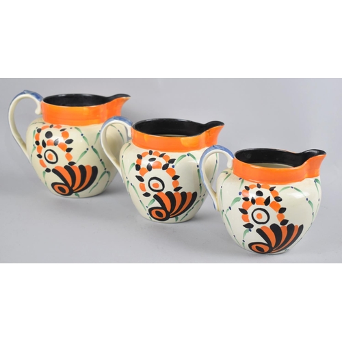 248 - A Set of Three Graduated Arabesque Jugs by Soho Pottery