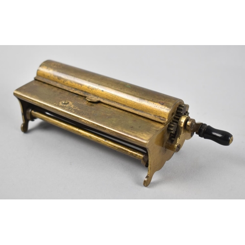 29 - A Vintage Brass Cigarette Rolling Machine, The Concinnum, 13cms Wide