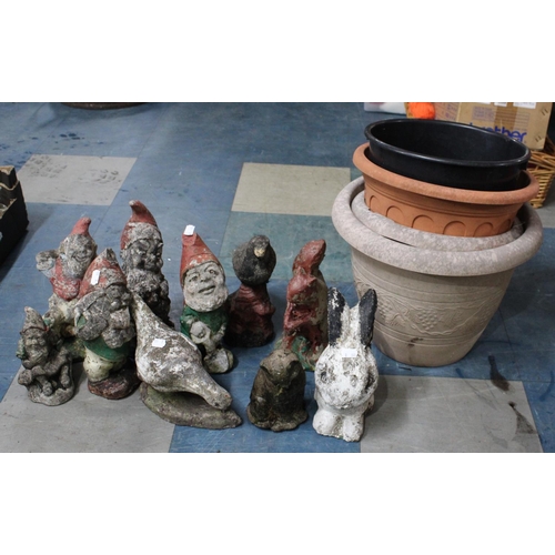 304 - A Collection of Reconstituted Stone Ornaments to include Gnomes, Rabbit Etc, Tallest 28cms, together... 