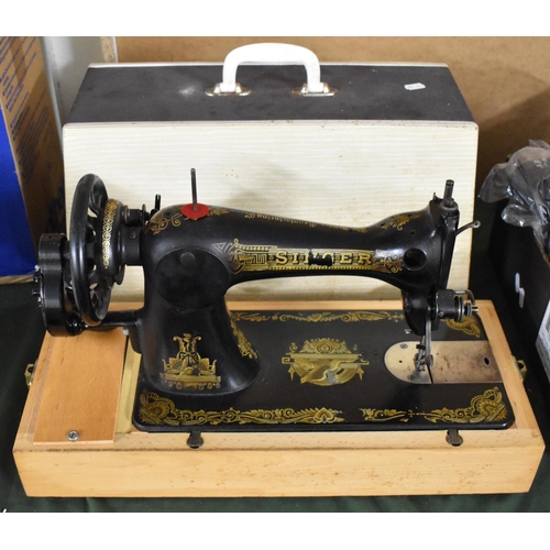 316 - A Vintage Singer Sewing Machine with Carry Case