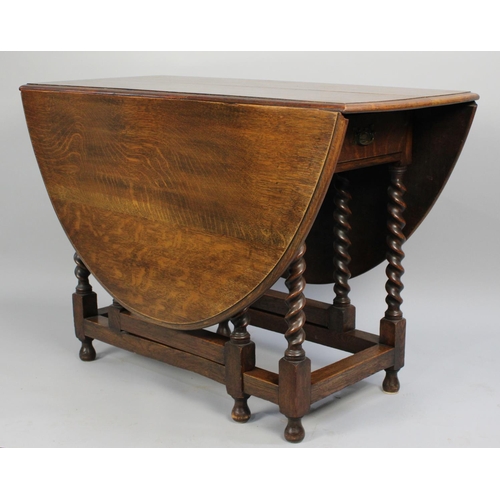 319 - A Mid 20th Century Oak Barley Twist Drop Leaf Gate Leg Table with Oval Top, 112cms Long