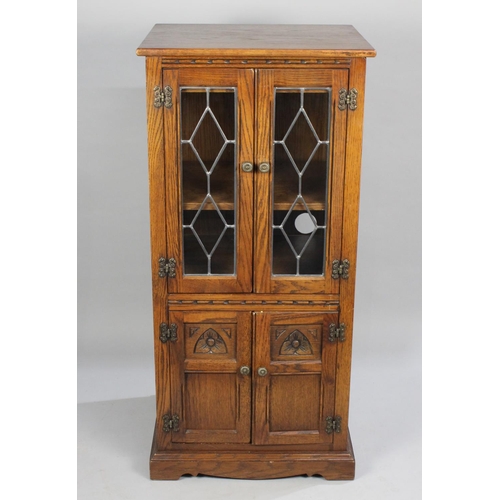 320 - An Old Charm Media Cabinet with Lead Glazed Doors to Top Section, Base Cupboard with Two Small Drawe... 