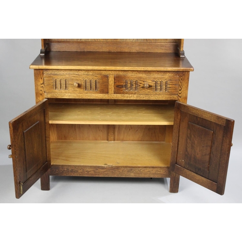 322 - A Mid 20th Century Oak Dresser in the Old Charm Style, Base Section with Two Small Drawers over Cupb... 