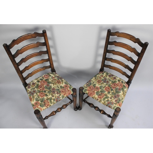 325 - A Set of Six Reproduction Ladder Back Tapestry Seated Dining Chairs