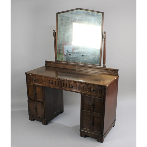 335 - A Mid 20th Century Oak Kneehole Dressing Table with Two Long and Two Short Drawers Either Side Kneeh... 