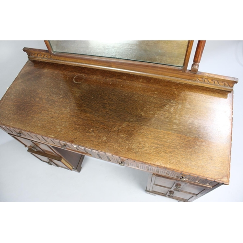 335 - A Mid 20th Century Oak Kneehole Dressing Table with Two Long and Two Short Drawers Either Side Kneeh... 