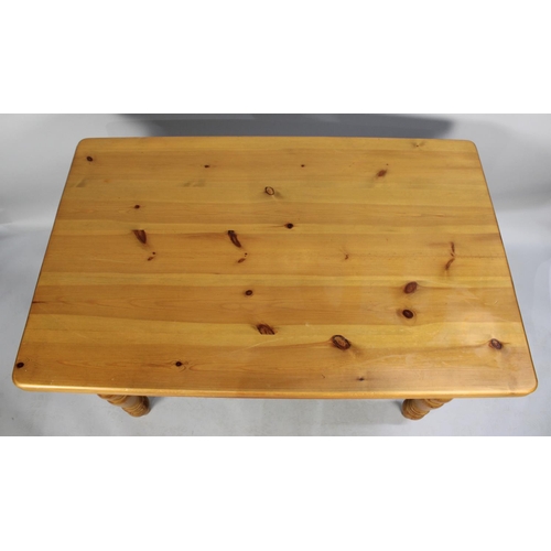 344 - A Modern Rectangular Pine Kitchen Table, Turned Supports, 122cms by 76cms