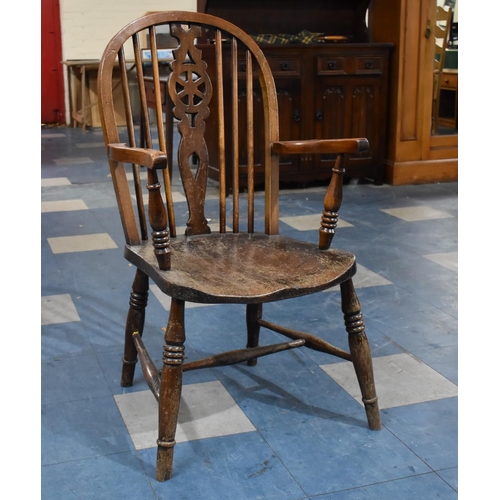 350 - A Mid 20th Century Wheel Back Windsor Style Armchair