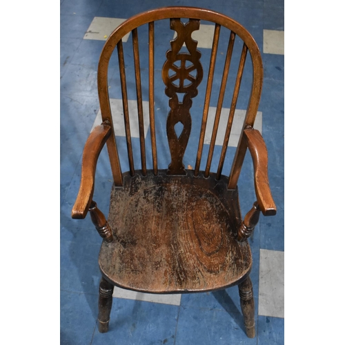 350 - A Mid 20th Century Wheel Back Windsor Style Armchair