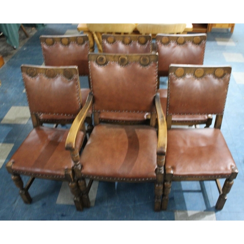 353 - A Set of Six Mid 20th Century Oak Framed Hide Upholstered Dining Chairs to include One Carver