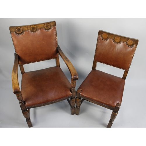 353 - A Set of Six Mid 20th Century Oak Framed Hide Upholstered Dining Chairs to include One Carver