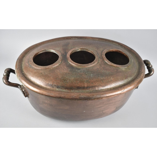 45 - A Heavy Copper Patinated Cast Metal Three Bottle Wine Cooler with Two Carrying handles, 57cms Wide