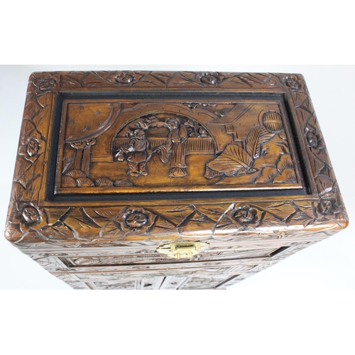 52 - A Mid 20th Century Carved Oriental Box on Stand with Hinged Lid, Centre Long Drawer and Base Cupboar... 