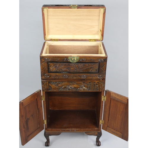 52 - A Mid 20th Century Carved Oriental Box on Stand with Hinged Lid, Centre Long Drawer and Base Cupboar... 