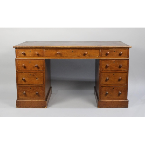 61 - An Edwardian Kneehole Writing Desk with Rexine Inset Top, For Restoration, 121cms Wide