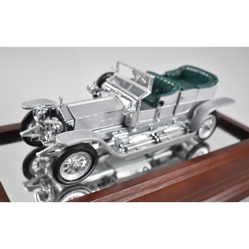 107 - A Cased Model of a 1907 Rolls Royce Silver Ghost by the Franklin Mint on Mirrored Plinth, 23cm wide