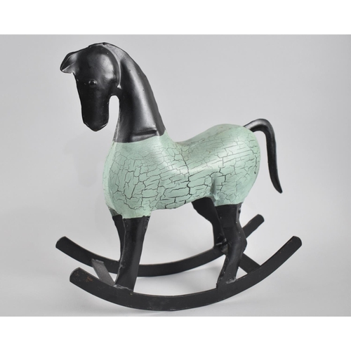 109 - A Modern Tinplate Model of a Rocking Horse, 71cm long and 31cm high