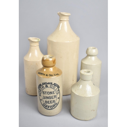 121 - A Collection of Five Stoneware Bottles, Tallest 28cm